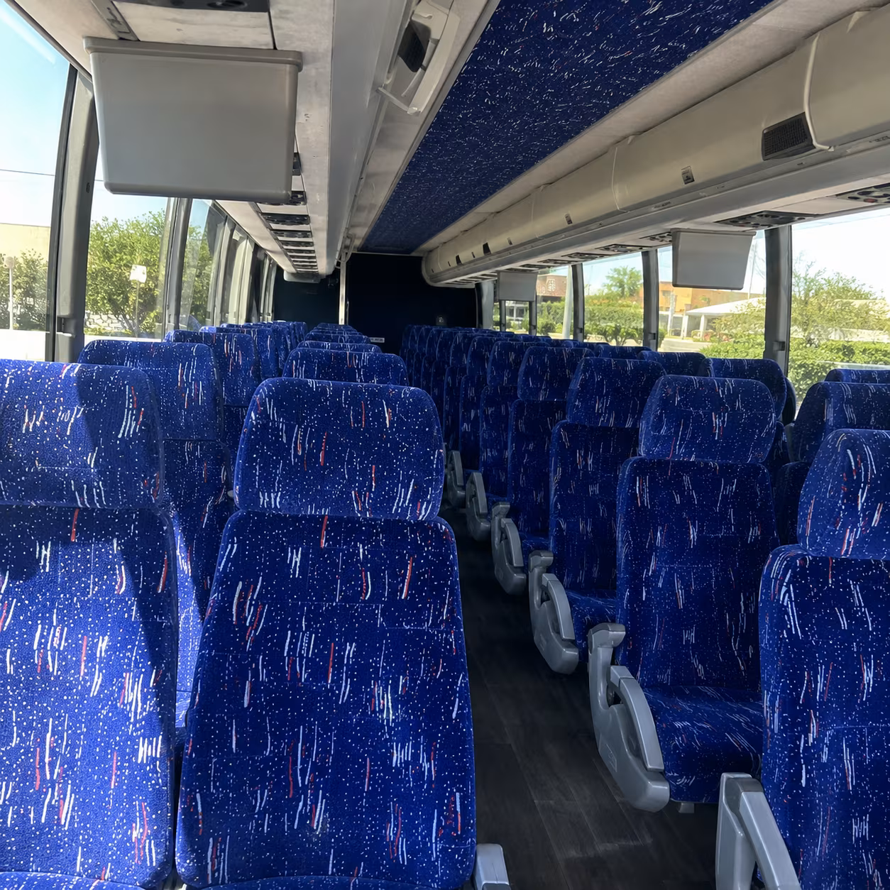 how distance and duration affect charter bus rates in newton massachusetts